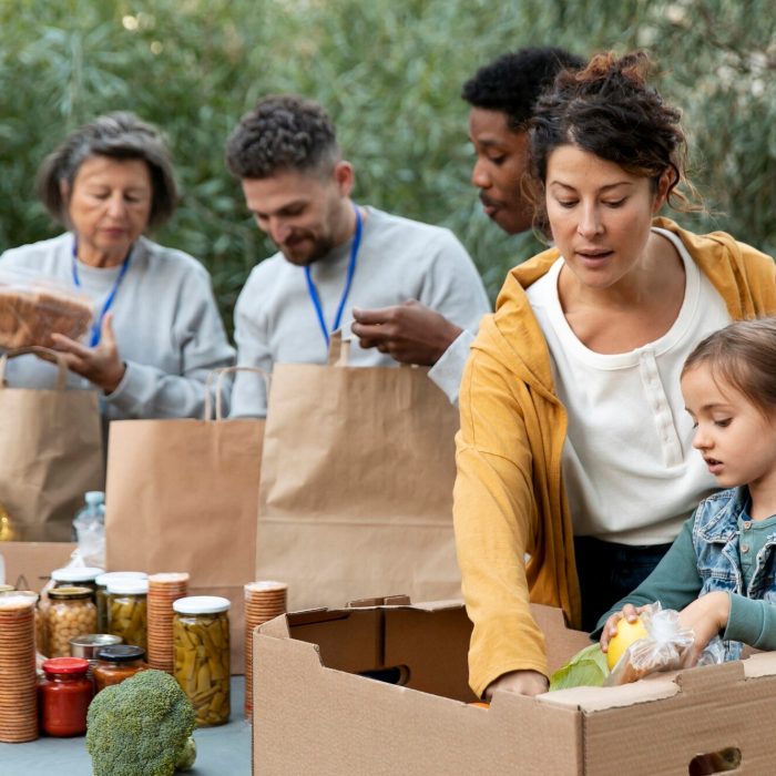 people-collecting-food-donations-medium-shot_23-2149182020